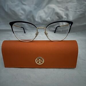Tory Burch navy and gold cat eye frame. Gorgeous rope detail on the side.